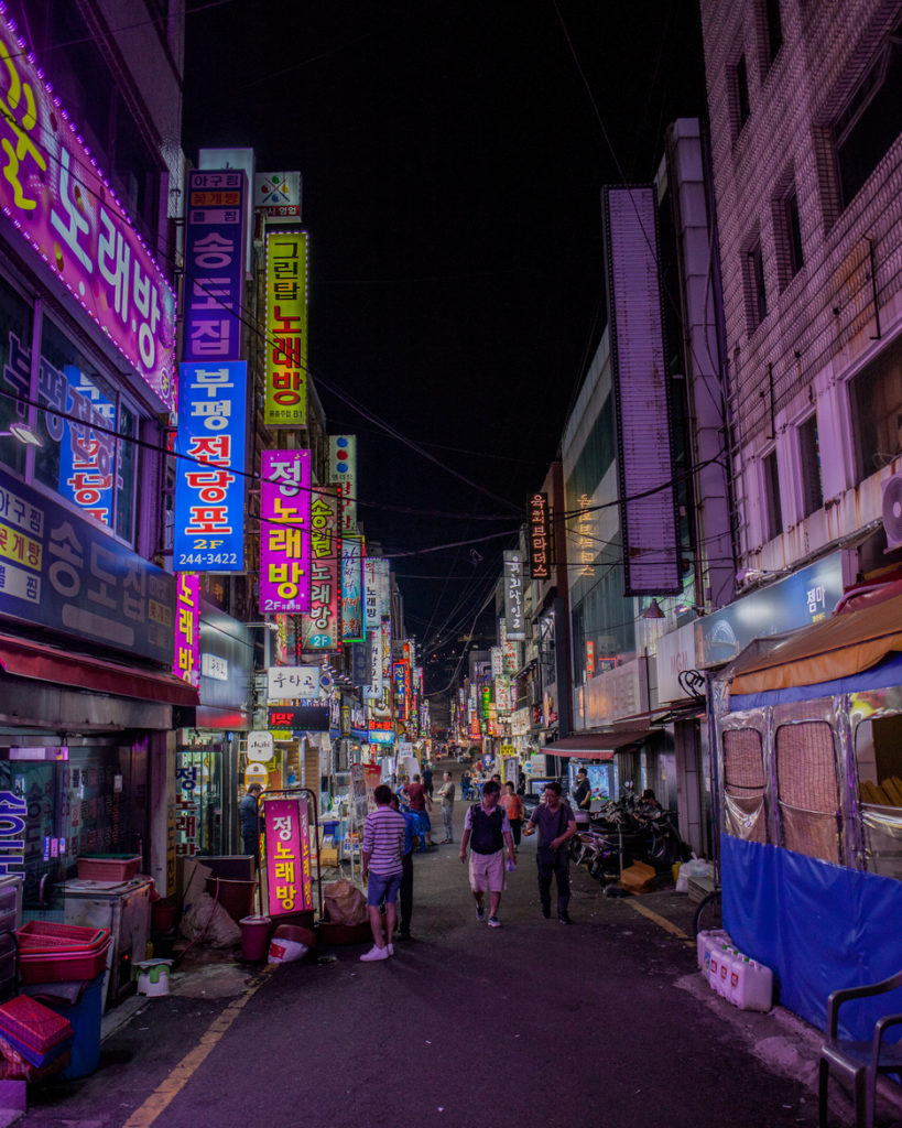 Busan, South Korea night street with signs