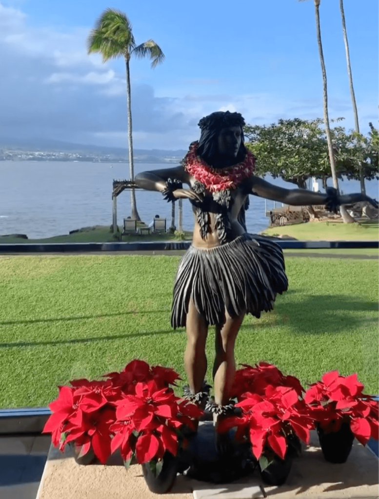 Hawaiian dancing lady statue near hilo hotel