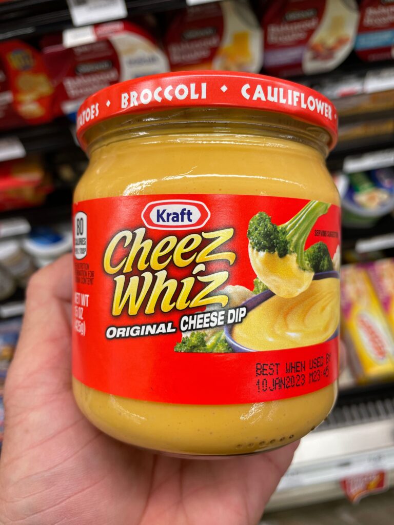 cheez whiz sauce in a glass jar