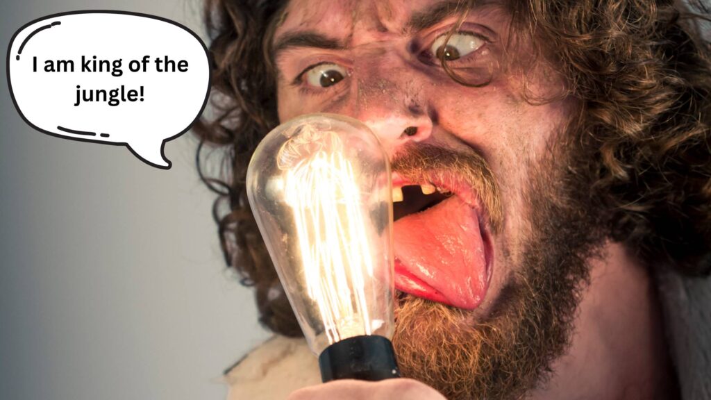caveman licking lightbulb stupid